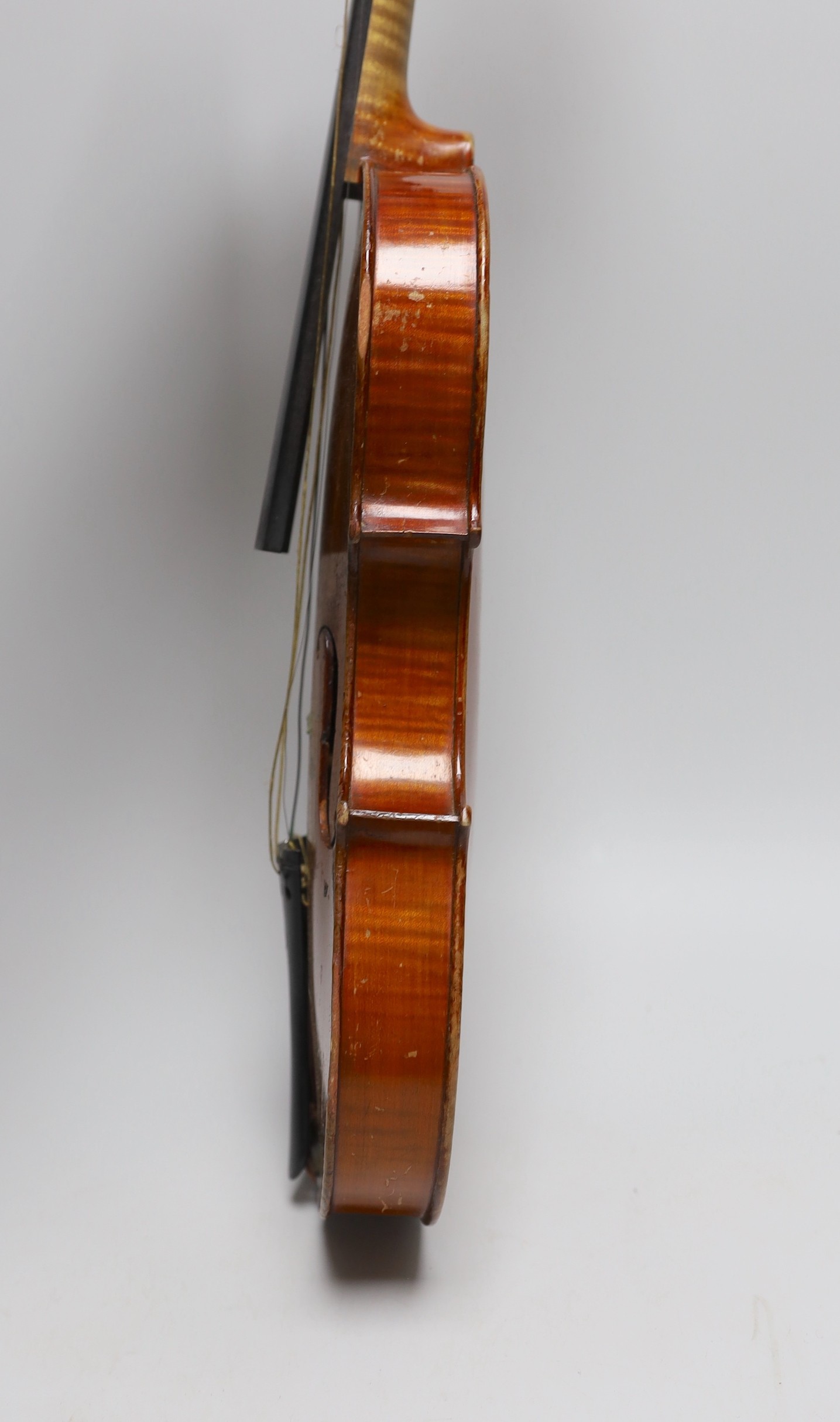 A cased 19th century French violin, back 34cm